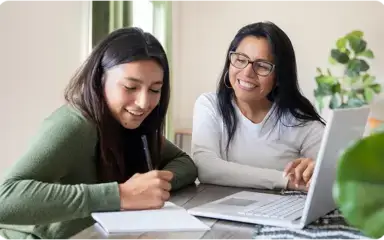 Mother and daughter doing homework together